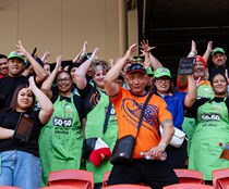 Dolphins and Fans Celebrate $1 Million 50-50 Milestone